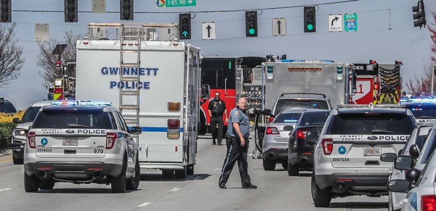 I-85 shut down as Gwinnett SWAT surrounds bus with armed man aboard