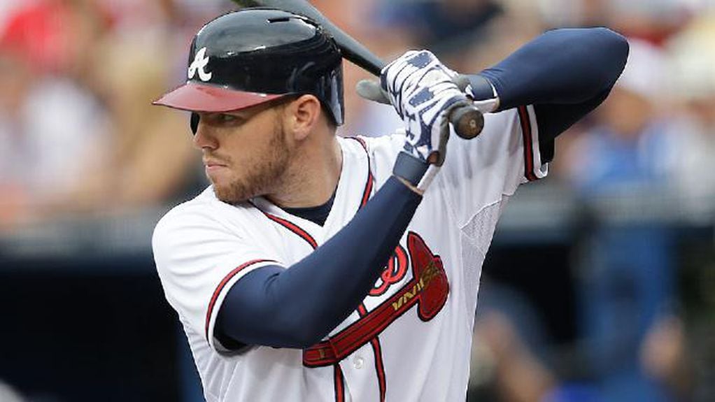 Braves' Freeman cleared to swing