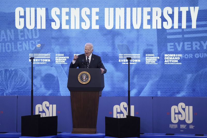 FILE - President Joe Biden speaks to Everytown for Gun Safety Action Fund's "Gun Sense University," at the Washington Hilton, June 11, 2024, in Washington. More than 500 people have been charged with federal crimes under new firearms trafficking and straw purchasing laws that are part of the landmark gun safety legislation President Joe Biden signed two years ago Tuesday. Some of the people were linked to transnational cartels and organized crime. That's according to a White House report obtained by The Associated Press. (AP Photo/Mark Schiefelbein, File)