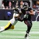 Atlanta Falcons running back Bijan Robinson (7) avoids a tackle from Pittsburgh Steelers linebacker Patrick Queen (6) during the first half of an NFL football game against the Pittsburgh Steelers on Sunday, Sept. 8, at Mercedes-Benz Stadium in Atlanta. 
(Miguel Martinez/ AJC)