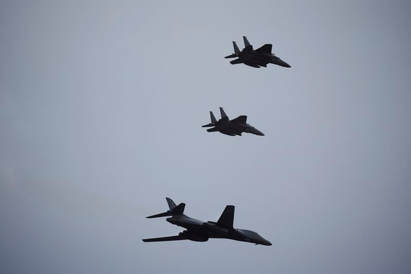 A U.S. Air Force B1 Bomber flies with South Korean Air Force's F-15K fighter jets during a celebration to mark 76th anniversary of Korea Armed Forces Day, in Seongnam, South Korea, Tuesday, Oct.1, 2024. (Kim Hong-Ji/Pool Photo via AP)