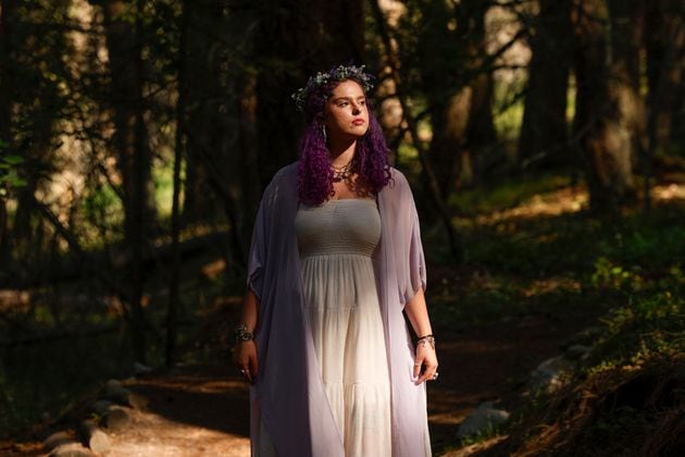 Olivia Vesovich, 20, poses for a portrait on her favorite hiking trail in Missoula, Montana on July 11, 2023. (Photo by Tailyr Irvine for The Washington Post via Getty Images)