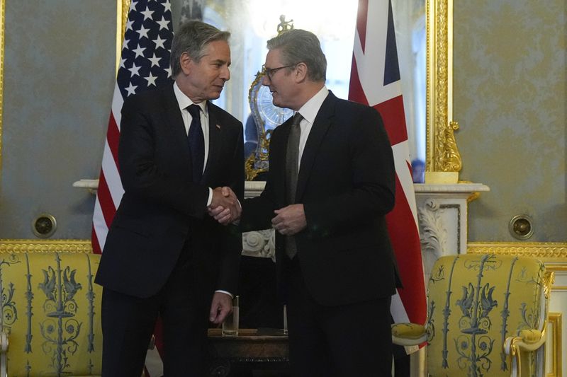 Britain's Prime Minister Keir Starmer, right, shakes hands with U.S. Secretary of State Antony Blinken as they meet at at Lancaster House in London, Tuesday, Sept. 10, 2024. (AP Photo/Mark Schiefelbein, Pool)