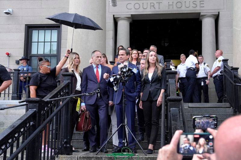 Defense attorneys David Yannetti, center left, and Alan Jackson, center, speak to reporters as Karen Read, center right, looks on in front of Norfolk Superior Court, Monday, July 1, 2024, in Dedham, Mass. A judge declared a mistrial Monday after jurors deadlocked in the case of Read, who was accused of killing her Boston police officer boyfriend by striking him with her SUV and leaving him in a snowstorm. (AP Photo/Steven Senne)