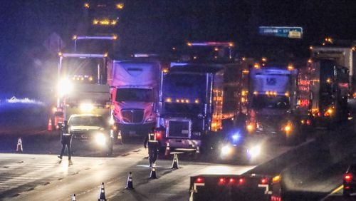 One person died in a crash that shut down northbound I-85 at Flat Shoals Road Wed., May 11, 2016. JOHN SPINK / JSPINK@AJC.COM