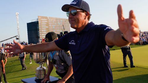 Phil Mickelson celebrates after winning the final round at the PGA Championship on the Ocean Course, Sunday, May 23, 2021, in Kiawah Island, S.C. (David J. Phillip/AP)