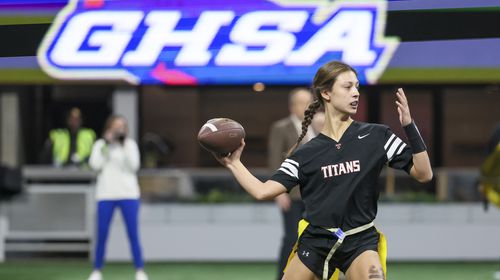 North Oconee quarterback Catherine Cooper attempts a pass during their game against SE Bulloch in the Girl’s Flag Football A-4A GHSA State Championship game at Mercedes-Benz Stadium, Monday, December. 11, 2023, in Atlanta. SE Bulloch won 14-0. (Jason Getz / Jason.Getz@ajc.com)