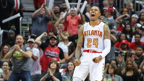 April 22, 2017, Atlanta: Atlanta Hawks Kent Bazemore and fans celebrate as he hits a three against the Washington Wizards on the way to a 116-98 victory in game 3 of a first-round NBA basketball playoff series on Saturday, April 22, 2017, in Atlanta.  Curtis Compton/ccompton@ajc.com