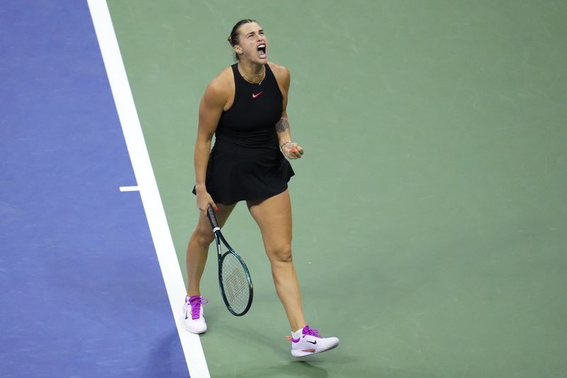 Aryna Sabalenka, of Belarus, reacts against Emma Navarro, of the United States, during the women's singles semifinals of the U.S. Open tennis championships, Thursday, Sept. 5, 2024, in New York. (AP Photo/Kirsty Wigglesworth)