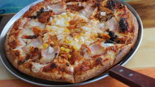 160713- SUWANEE- GA- Ligaya Figueras restaurant review of BonBon in Gwinnett. FOOD: Kimchee Pizza- applewood smoked bacon, kimchee, garlic, corn, onions and mozzarella. (BECKY STEIN PHOTOGRAPHY)