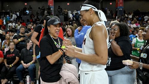 South Carolina coach Dawn Staley and Atlanta Dream guard Allisha Gray visit at the Gateway Center Arena on July 2, 2024, in Atlanta. (Hyosub Shin / AJC)