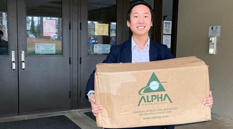 Jonathan "JT" Wu, founder and executive director of Preface, a local nonprofit childhood literacy advocacy organization, delivers hand sanitizer to Gwinnett schools on Friday. One bottle per family will be distributed on Monday while supplies last. CONTRIBUTED