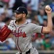 Atlanta Braves' Chris Sale pitches during the first inning of a baseball game against the New York Mets, Thursday, July 25, 2024, in New York. (AP Photo/Pamela Smith)