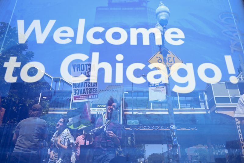 Protesters gather for a march to the Democratic National Convention Monday, Aug. 19, 2024, in Chicago. (AP Photo/Noah Berger)