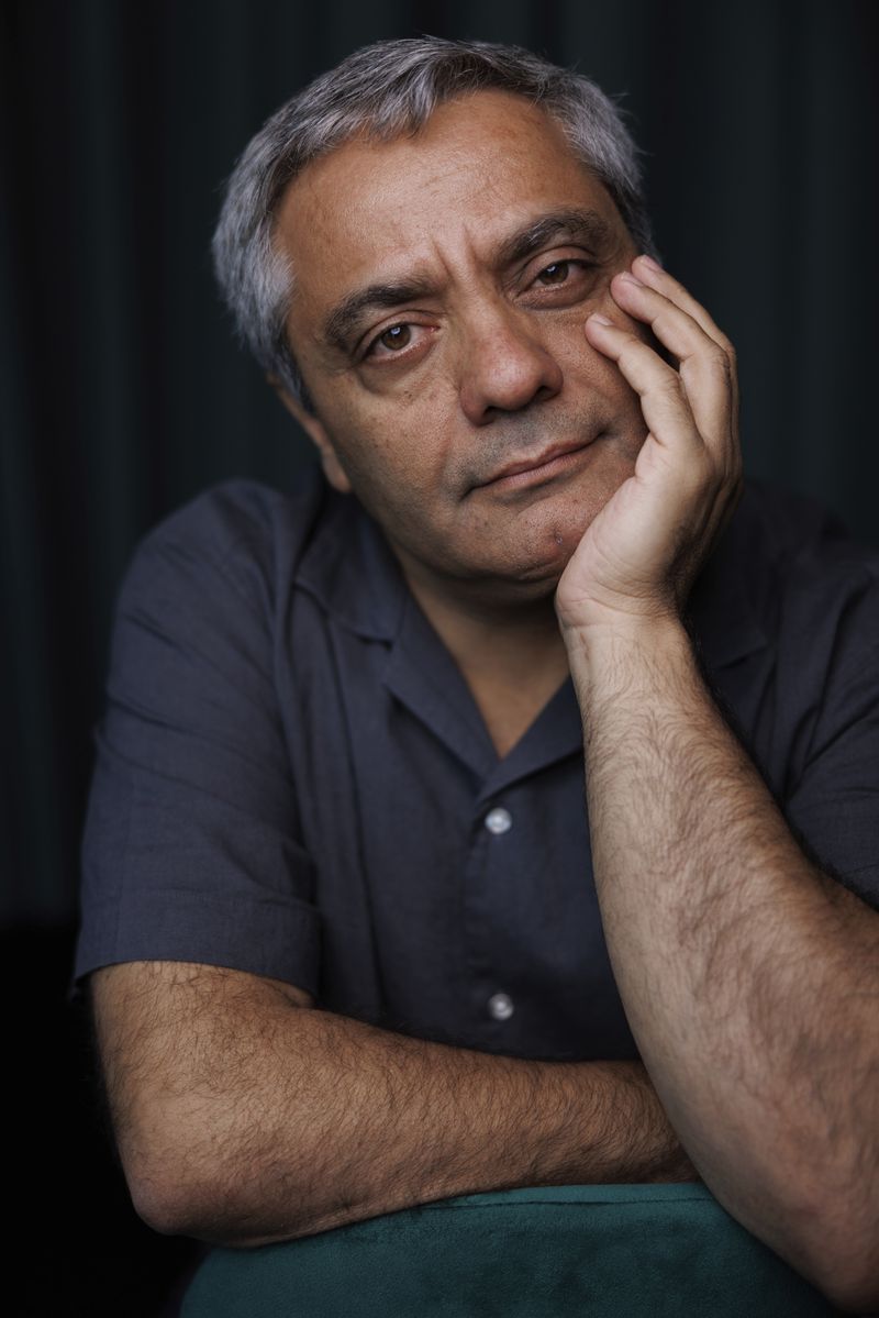 Director Mohammad Rasoulof poses for a portrait photograph for the film 'The Seed of the Sacred Fig' at the 77th international film festival, Cannes, southern France, Thursday, May 23 2024. (Photo by Vianney Le Caer/Invision/AP)