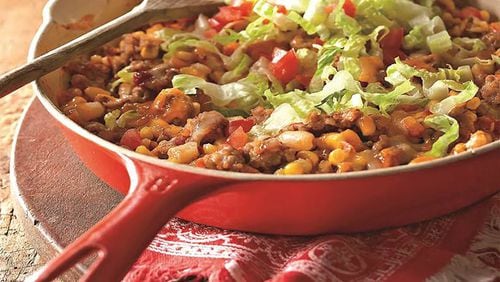 Friday’s Mexican Rice and Bean Skillet With Chorizo is not an expensive meal to prepare. Contributed by “Better Homes and Gardens: Skillet Meals,” Jan Miller, editor; Houghton Mifflin Harcourt, 2016.