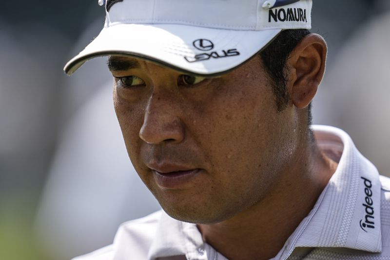 Hideki Matsuyama, of Japan, walks to the 10th tee during a practice round of the Tour Championship golf tournament, Wednesday, Aug. 28, 2024, in Atlanta. (AP Photo/Mike Stewart)