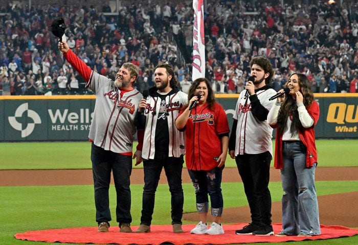 The national anthem is performed by the Jordan Family Band during game two of the National League Division Series baseball game between the Braves and the Phillies at Truist Park in Atlanta on Wednesday, October 12, 2022. (Hyosub Shin / Hyosub.Shin@ajc.com)