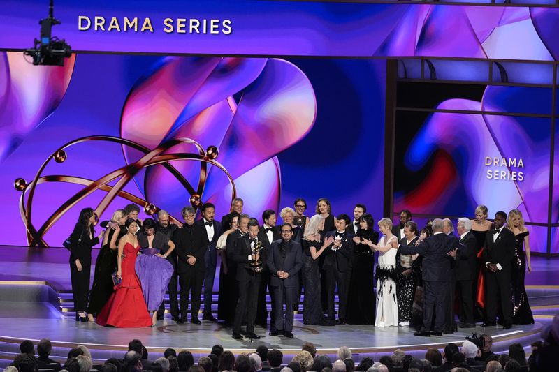 Justin Marks, left center, and Hiroyuki Sanada, center right, and the team from "Shogun" accepts the award for outstanding drama series during the 76th Primetime Emmy Awards on Sunday, Sept. 15, 2024, at the Peacock Theater in Los Angeles. (AP Photo/Chris Pizzello)