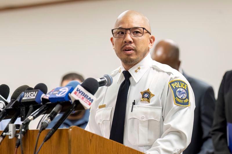 Forest Park Police Department Deputy Police Chief Christopher Chin speaks to reporters at the Forest Park Village Hall over the shooting death of four people on a Chicago-area transit Blue Line train yesterday morning, Tuesday, Sept. 3, 2024, in Forest Park, Ill. (Tyler Pasciak LaRiviere/Chicago Sun-Times via AP)