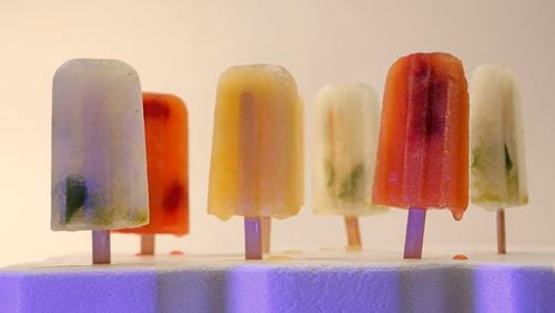 From left, a Mojito popsicle, Peach sangria popsicle, Margarita popsicle, Mojito popsicle, Peach sangria popsicle, and Mojito popsicle. (Anne Cusack/Los Angeles Times/TNS)
