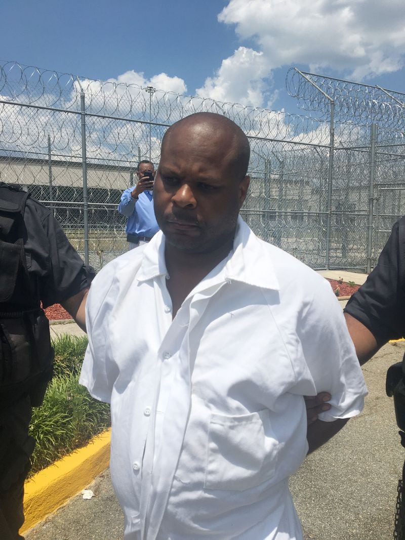 Tracey Wise, shown here being led out of Baldwin State Prison, was a correctional officer from 1999 until 2021, when it was discovered that he had been smuggling papers laced with K-2, a synthetic form of marijuana, for a notorious gang member. (POST case file)