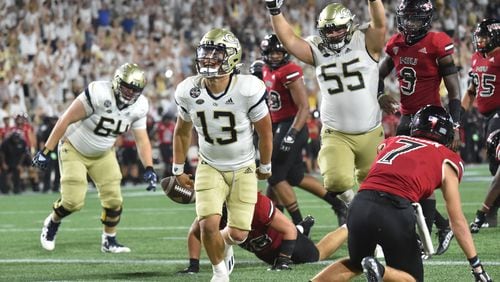 September 4, 2021 Atlanta - Georgia Tech's quarterback Jordan Yates (13) celebrates after he scored a touchdown during the second half of an NCAA college football game at Georgia Tech's Bobby Dodd Stadium in Atlanta on Saturday, September 4, 2021. Northern Illinois won 22-21 over Georgia Tech(Hyosub Shin / Hyosub.Shin@ajc.com)