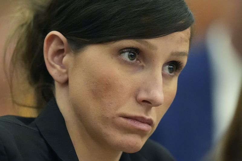 Kouri Richins, a Utah mother of three who wrote a children's book about coping with grief after her husband's death and was later accused of fatally poisoning him, looks on during a hearing, on Monday, Aug. 26, 2024, in Park City, Utah. (AP Photo/Rick Bowmer, Pool)