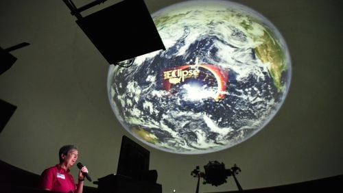 The Fernbank Science Center is slated for $3.2 million in upgrades. Pictured here is a presentation about the total solar eclipse given to DeKalb teachers in 2017 at the center. About 80 fourth grade teachers received safety lessons for the solar filters and the physics of a solar eclipse, so they could relay the info to their students. (Hyosub Shin / AJC file photo)