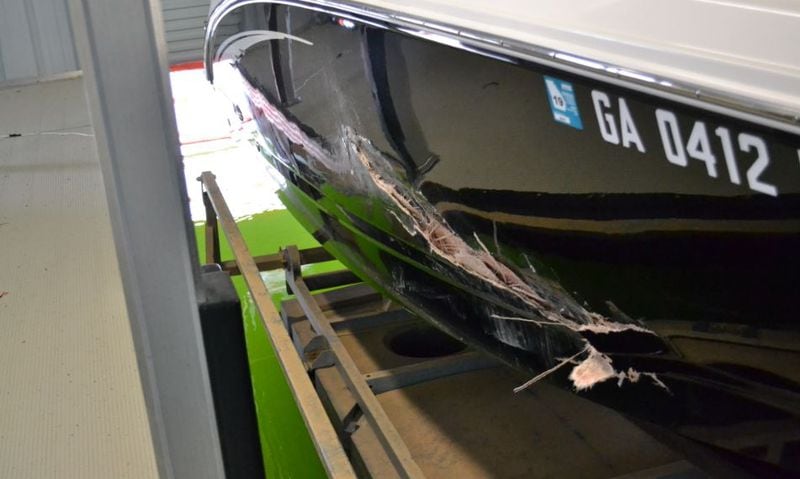 Damage from one of the boats that collided Wednesday afternoon on Lake Lanier.