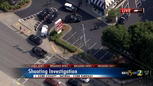 Police are investigating a shooting at a Steak 'n Shake in Smyrna.