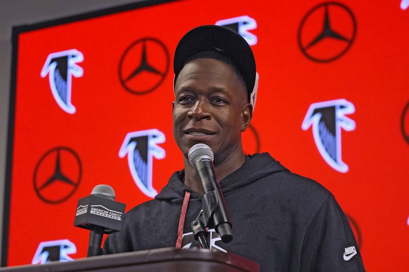 Atlanta Falcons head coach Raheem Morris speaks to the media after the team defeated the Tampa Bay Buccaneers during overtime in an NFL football game Friday, Oct. 4, 2024, in Atlanta. (AP Photo/John Bazemore)