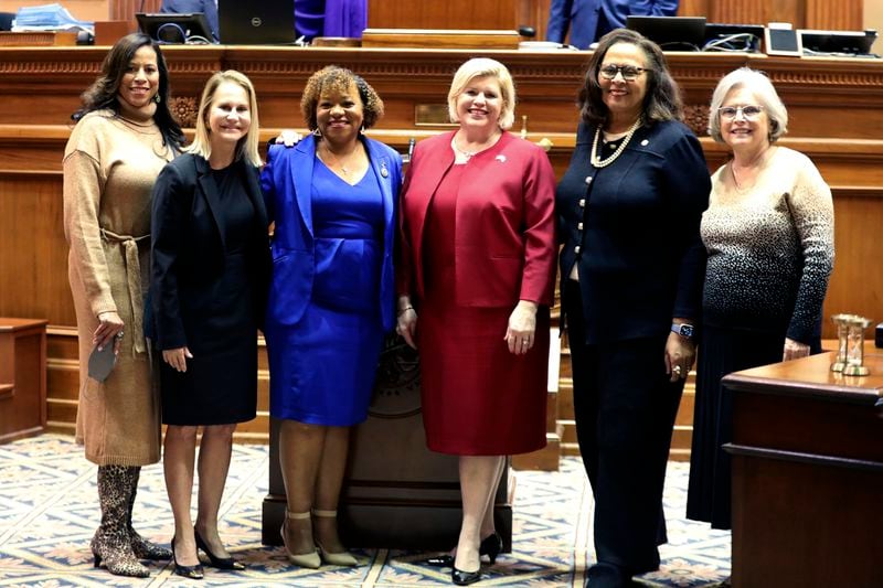 FILE - The six women in the South Carolina Senate pose after Sen. Tameika Isaac Devine was sworn in on Tuesday, Jan. 9, 2024. The senators are from left to right: Sen. Mia McLeod, I-Columbia; Sen. Sandy Senn, R-Charleston; Sen. Devine, D-Columbia; Sen. Penry Gustafson, R-Camden; Sen. Margie Bright Matthews, D-Walterboro; and Sen. Katrina Shealy, R-Lexington. All three of the Republican Sister Senators were defeated in their party's primary and McLeod isn't running for reelection, meaning there may only be two women senators in the 46-member body in 2025. (AP Photo/Jeffrey Collins, File)
