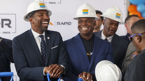 Atlanta Mayor Andre Dickens, left, and MARTA CEO Collie Greenwood were all smiles during a groundbreaking ceremony earlier this month for MARTA’s Summerhill bus rapid transit line, the first line in a $2.7 billion transit expansion that Atlanta voters approved in 2016. It was a break in a recently tense relationship between the city and the transit agency over progress in the expansion. (Jason Getz / Jason.Getz@ajc.com)