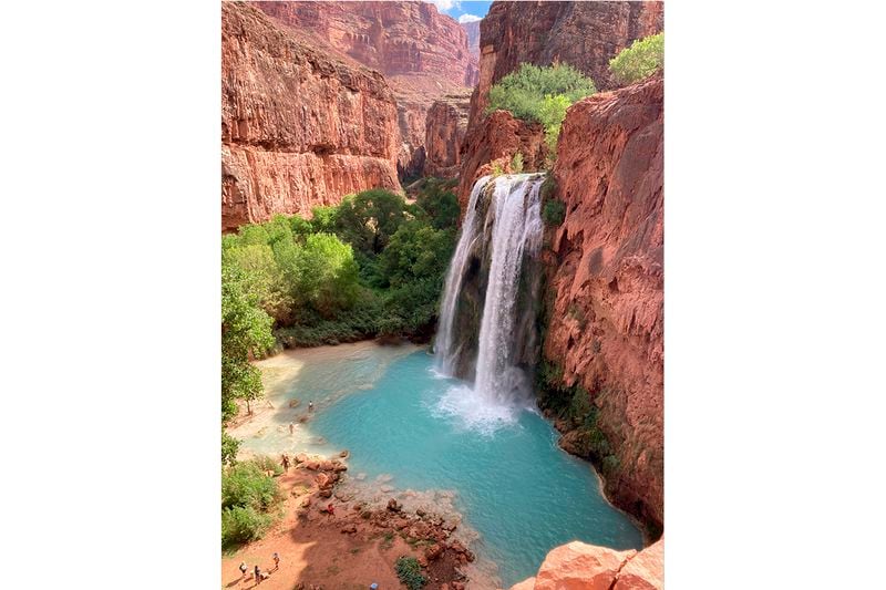 This photo provided by Francesca Dupuy shows the Havasu Falls on the Havasupai reservation in Arizona, Sept. 4, 2023. Dozens of tourists say they fell ill on a recent visit to a popular and picturesque stretch of waterfalls deep in a gorge neighboring Grand Canyon National Park. (Francesca Dupuy via AP)