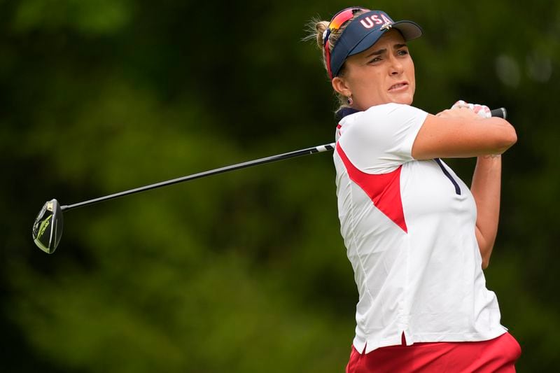 United States' Lexi Thompson hits from the third tee during a Solheim Cup golf tournament singles match at the Robert Trent Jones Golf Club, Sunday, Sept. 15, 2024, in Gainesville, Va. (AP Photo/Chris Szagola)