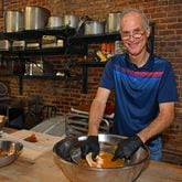 While volunteering at Staplehouse, Mike Smith strains sweet potatoes using a tamis and plastic paddle. The East Cobb resident has volunteered in close to 30 Atlanta restaurants because he loves learning food preparatio.. Chris Hunt for The Atlanta Journal-Constitution