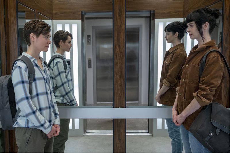 This image released by AMC+ shows August Winter, left, and Krysten Ritter in a scene from "Orphan Black: Echoes." (Sophie Giraud/AMC via AP)