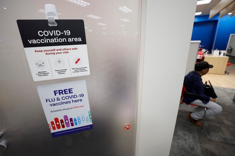 In this file photo, A COVID-19 sign is seen inside the CVS at North Decatur. The FDA gave the greenlight to a new updated COVID vaccine Thursday.  

Miguel Martinez /miguel.martinezjimenez@ajc.com