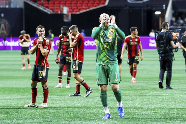 Atlanta United players wave to fans in the stands following an MLS soccer match against CF Montreal on Wednesday, Oct. 2, 2024. (Miguel Martinez/Atlanta Journal-Constitution via AP)