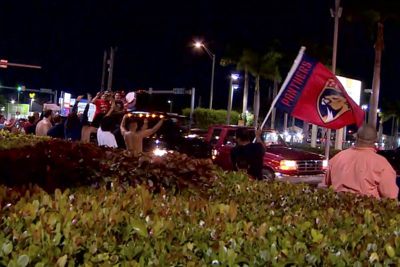 In this image made from video provided by WSVN-TV, people celebrate on the street in Hialeah, Fla., Monday, June 24, 2024, after the Florida Panthers won the Stanley Cup, beating the Edmonton Oilers Monday night. (WSVN-TV via AP)