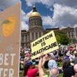 FILE - Abortion rights protesters rally near the Georgia state Capitol in Atlanta, on May 14, (Ben Gray/Atlanta Journal-Constitution via AP)