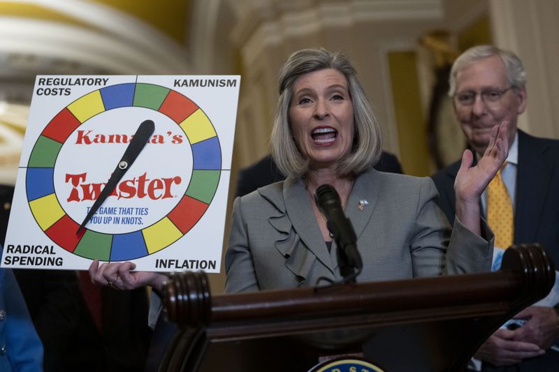 Sen. Joni Ernst, R-Iowa, speaks to the media following the Senate Republican policy luncheon at Capitol Hill in Washington, Tuesday, Sept. 17, 2024. (AP Photo/Ben Curtis)