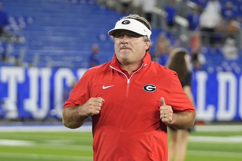 Georgia head coach Kirby Smart runs off the field following an NCAA college football game against Kentucky, Saturday, Sept. 14, 2024, in Lexington, Ky. (AP Photo/Darron Cummings)