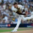 San Diego Padres starting pitcher Joe Musgrove throws to an Atlanta Braves batter during the first inning in Game 2 of an NL Wild Card Series baseball game Wednesday, Oct. 2, 2024, in San Diego. (AP Photo/Gregory Bull)