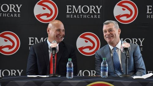 New Hawks GM Travis Schlenk (left) and Hawks principal owner Tony Ressler share a laugh before the press conference to officially introduce new general manager Travis Schlenk at Philips Arena on Friday, June 2, 2017. HYOSUB SHIN / HSHIN@AJC.COM