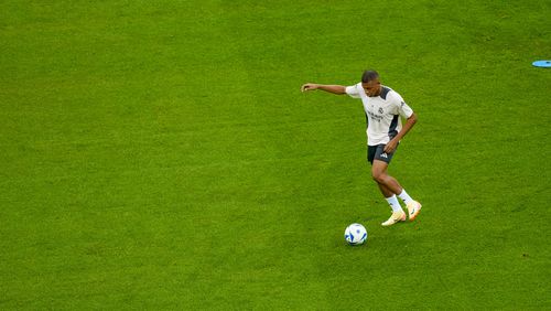 Real Madrid's Kylian Mbappe attends a training session ahead of the UEFA Super Cup Final soccer match between Real Madrid and Atalanta at the Narodowy stadium in Warsaw, Poland, Tuesday, Aug. 13, 2024. (AP Photo/Darko Vojinovic)