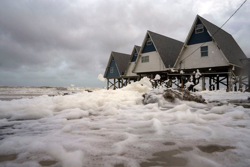Winds from Tropical Storm Alberto blow sea foam inland, Wednesday, June 19, 2024, in Surfside Beach, Texas. (Jon Shapley/Houston Chronicle via AP)