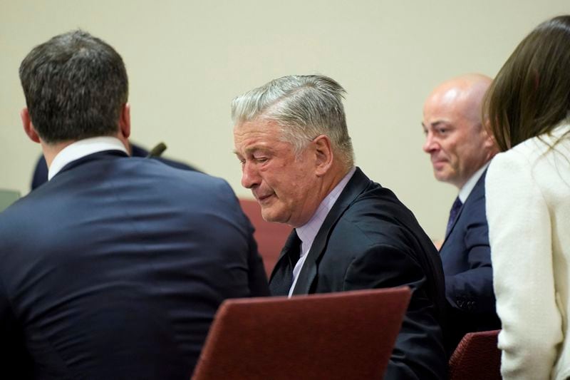 Actor Alec Baldwin reacts during his trial for involuntary manslaughter for the 2021 fatal shooting of cinematographer Halyna Hutchins during filming of the Western movie "Rust," Friday, July 12, 2024, at Santa Fe County District Court in Santa Fe, N.M. The judge threw out the case against Baldwin in the middle of his trial and said it cannot be filed again. (Ramsay de Give/Pool Photo via AP)