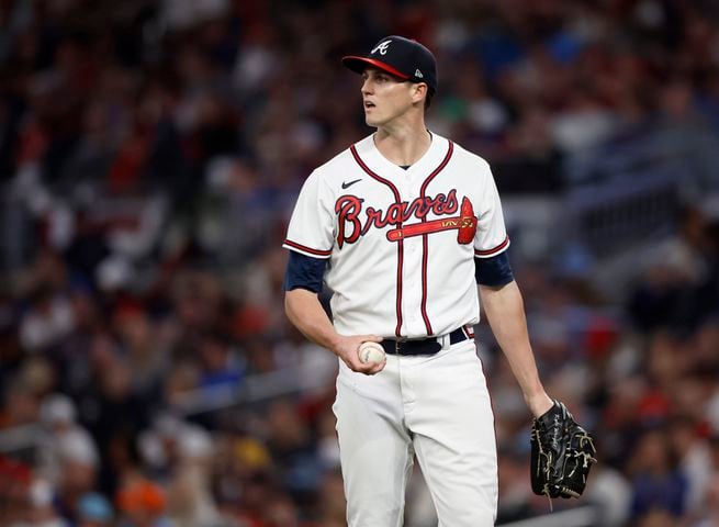 Atlanta Braves starting pitcher Kyle Wright (30) reacts after a Philadelphia Phillies fly out during the fourth inning of game two of the National League Division Series at Truist Park in Atlanta on Wednesday, October 12, 2022. (Jason Getz / Jason.Getz@ajc.com)
